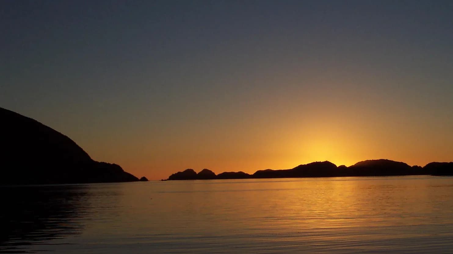 Breaksea Islands at the entrance to Bathurst Channel at sunset