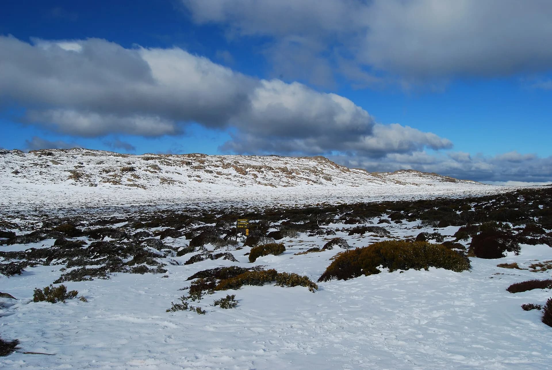 Snow-covered alpine plateau at Ben Lomond