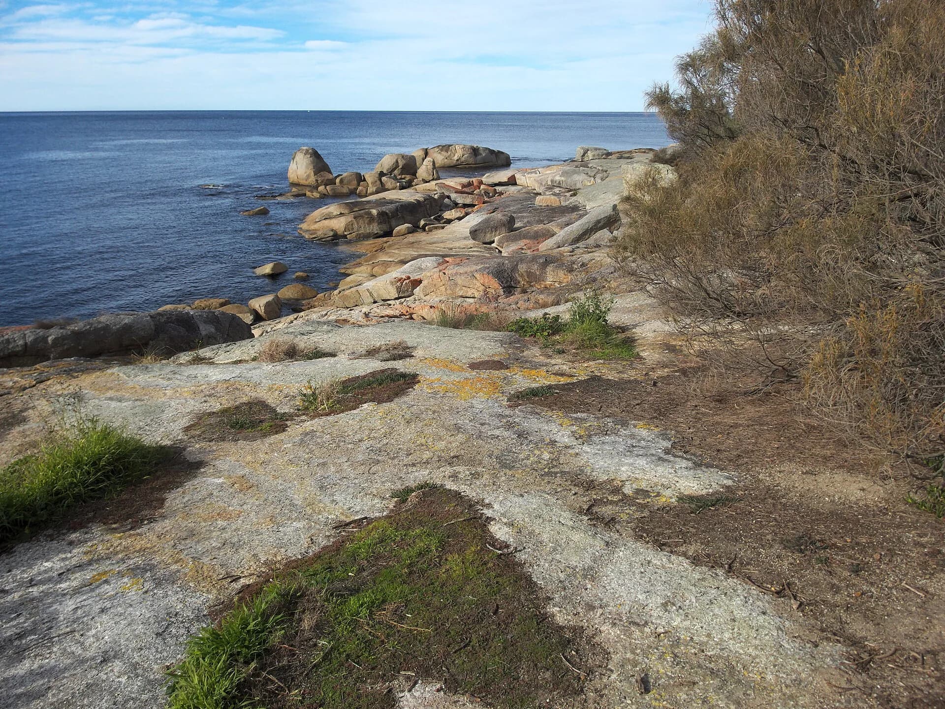 Public coastal rocks and water at Bicheno