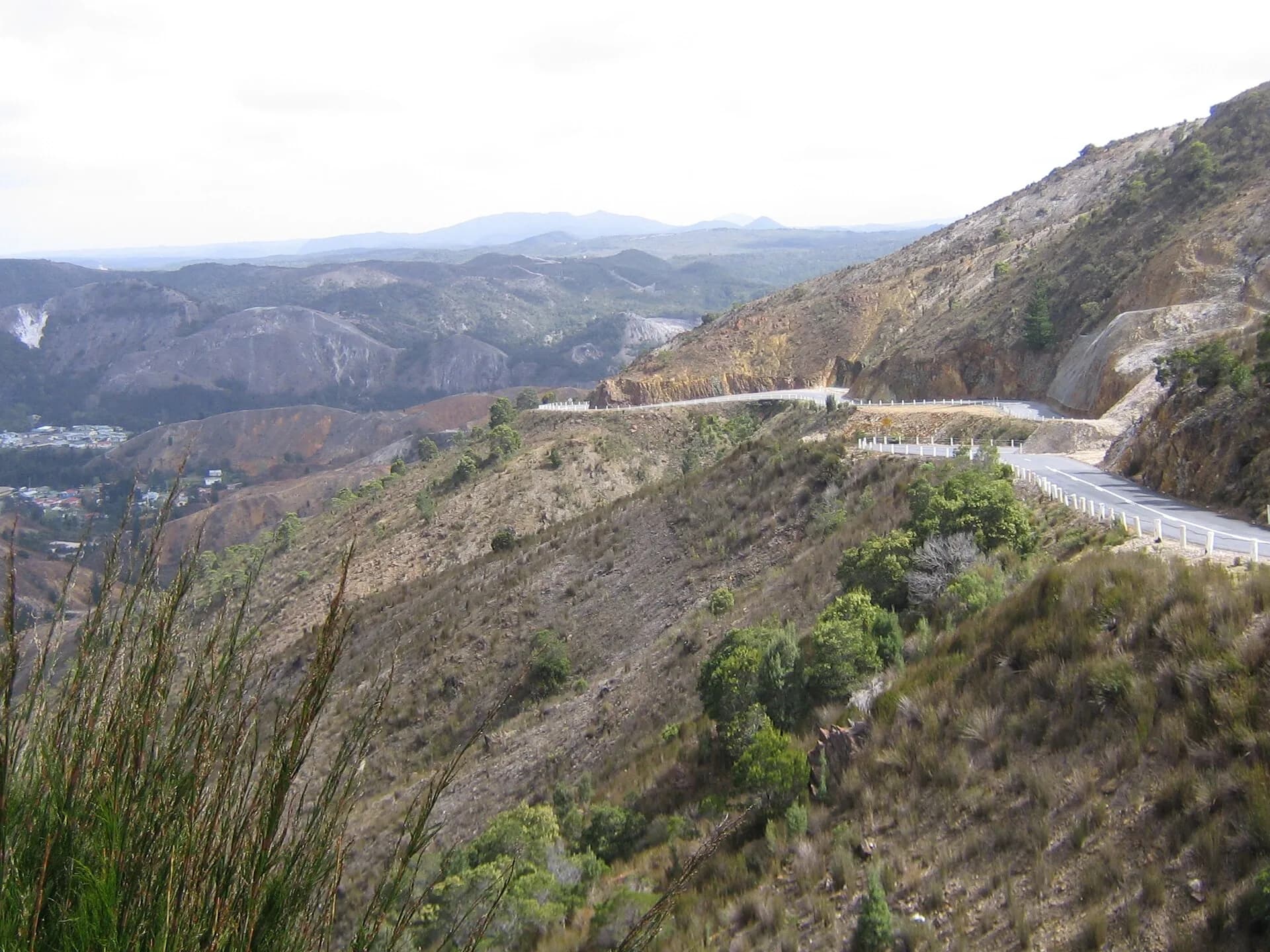 Winding road through steep west-coast terrain