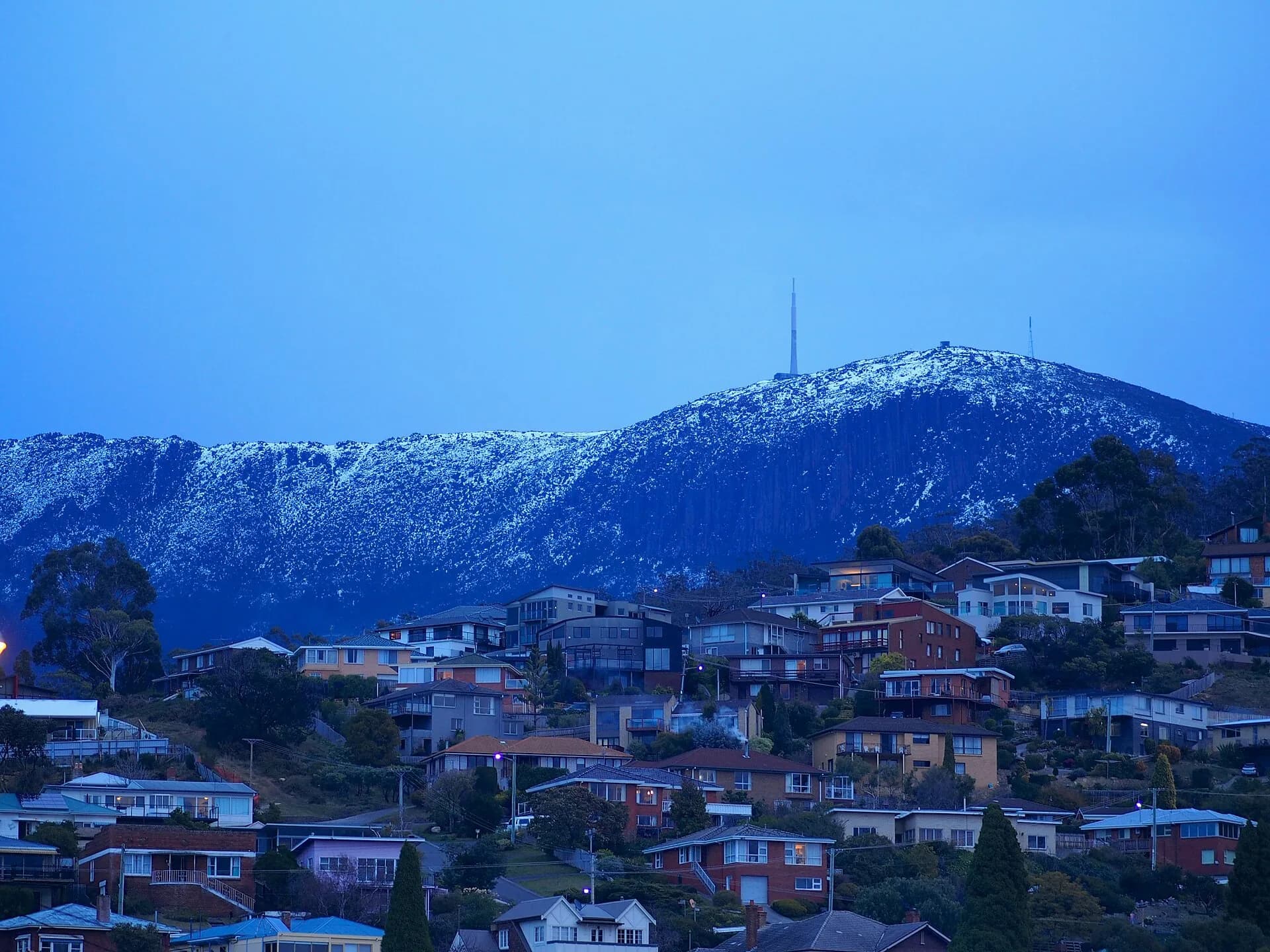 Hobart suburbs rising towards bushland on kunanyi / Mount Wellington