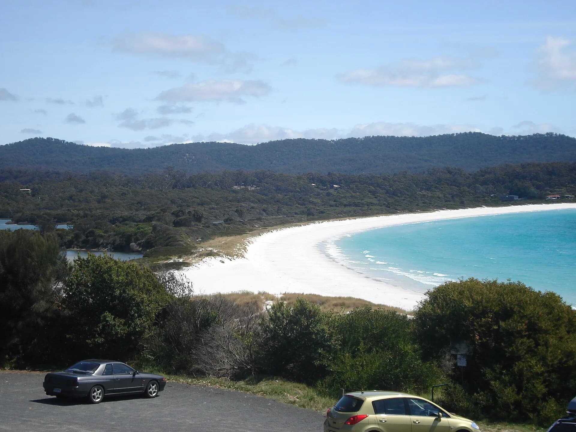 White sand and blue water at Binalong Bay Beach