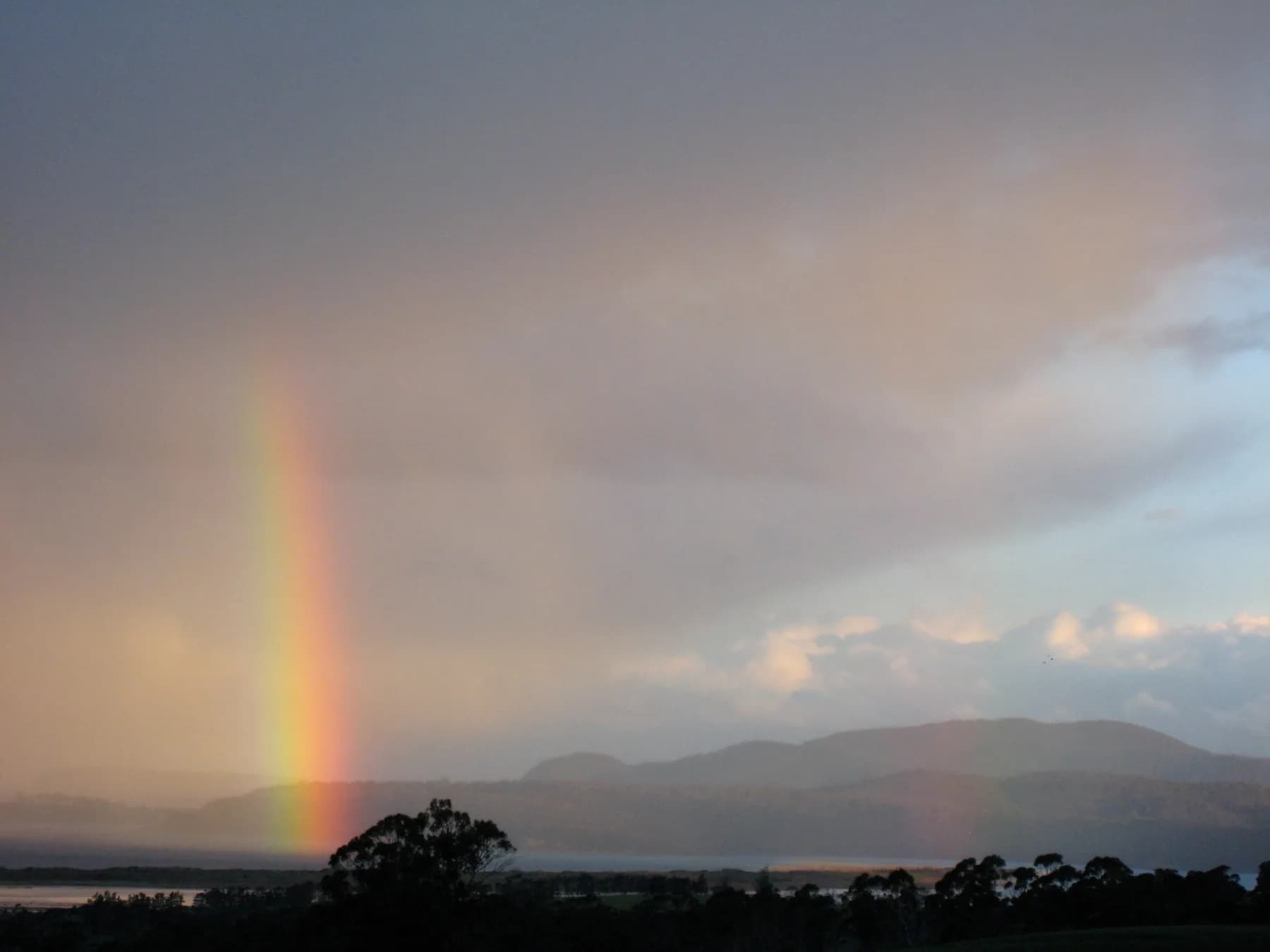 Rainbow over Marion Bay and its long sandy beach