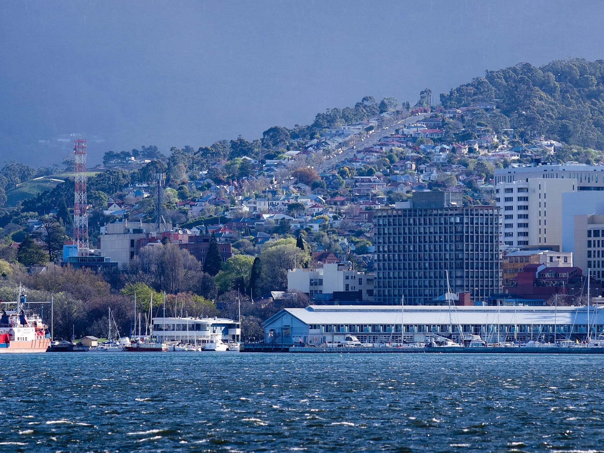 Modern Sullivans Cove with docks and city buildings
