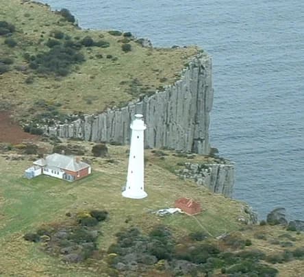 Tasman Island lighthouse above high sea cliffs