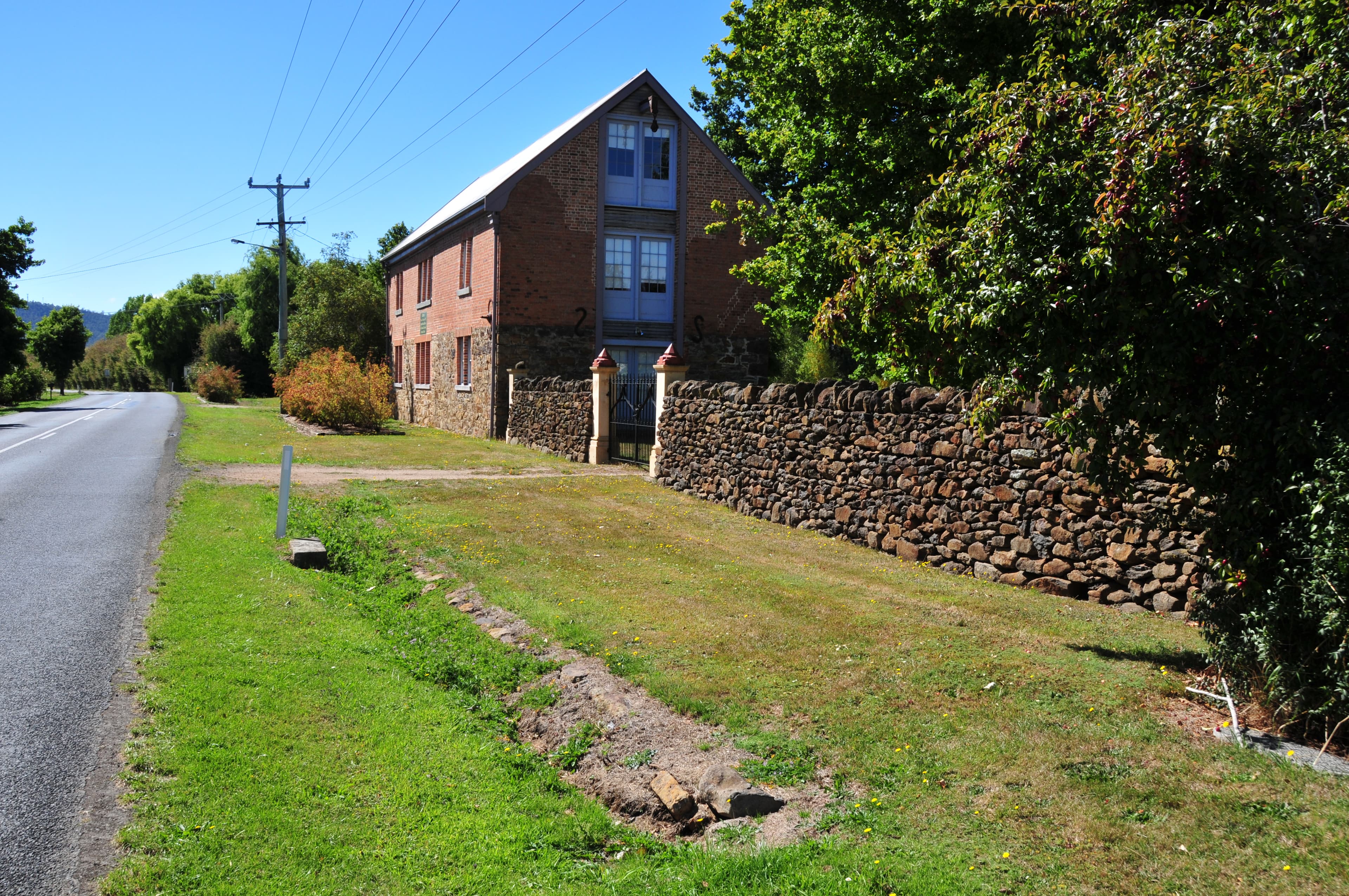 Former Van Diemen's Land Company grain store building, restored in 2002. Chudleigh, Tasmania, Australia