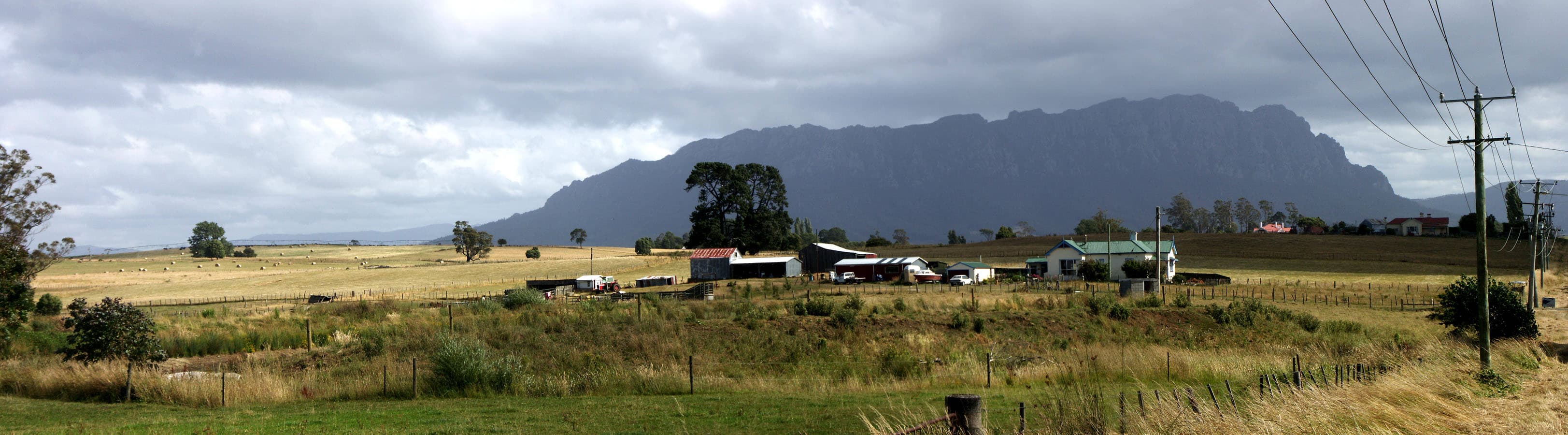 Tasmania - Farm in the countryside & Mount Roland in the background